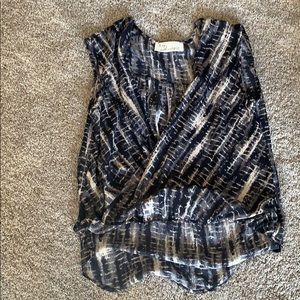 Woman’s open front sleeveless top